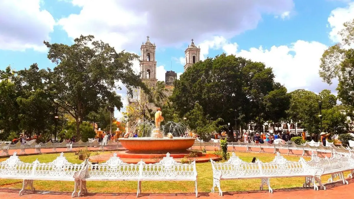 The twin-towered San Servacio church and central plaza in colonial Valladolid on a Chichén Itzá tour from Playa del Carmen, Mexico